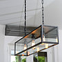 Moderne hanglamp Manoir 100 met zwarte metalen frame met helder glas voor industrieel en modern intrieur